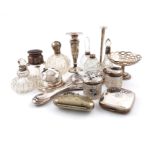 A mixed lot of silver items, various dates and makers, comprising: a silver travelling clock, London