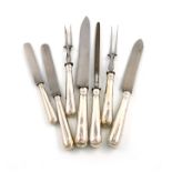 A matched set of twelve silver Old English Thread and Drop pattern table knives and dessert