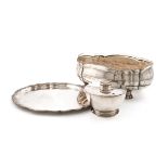 λA mixed lot of German silver items, comprising: a jardinière, of lobed oval form, clear glass