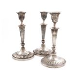 A pair of late-Victorian silver candlesticks, by Holland, Aldwinckle & Slater, London 1897, in the