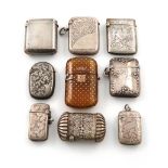 λA mixed lot of silver vesta cases, various dates and makers, comprising: one with chased foliate