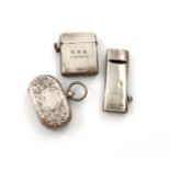 An Edwardian silver whistle vesta case, by John Millward Banks, Chester 1902, oblong rectangular