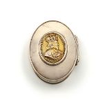 An early 18th century silver snuff box, unmarked circa 1720, oval form, the hinged cover set with an