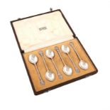 By Omar Ramsden, a set of six Arts and Crafts silver teaspoons, London 1932, oval bowls, spot-