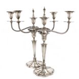 a pair of silver three-light candelabra, by A. Crichton, London 1919, tapering shaped oval form,