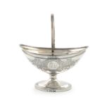 A George III silver swing-handled sugar basket, maker's mark W?, London 1800, oval form, later