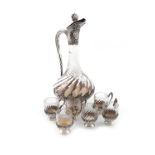 A French silver-mounted liqueur set, the ewer with maker's mark of R.B in a lozenge, the cups by