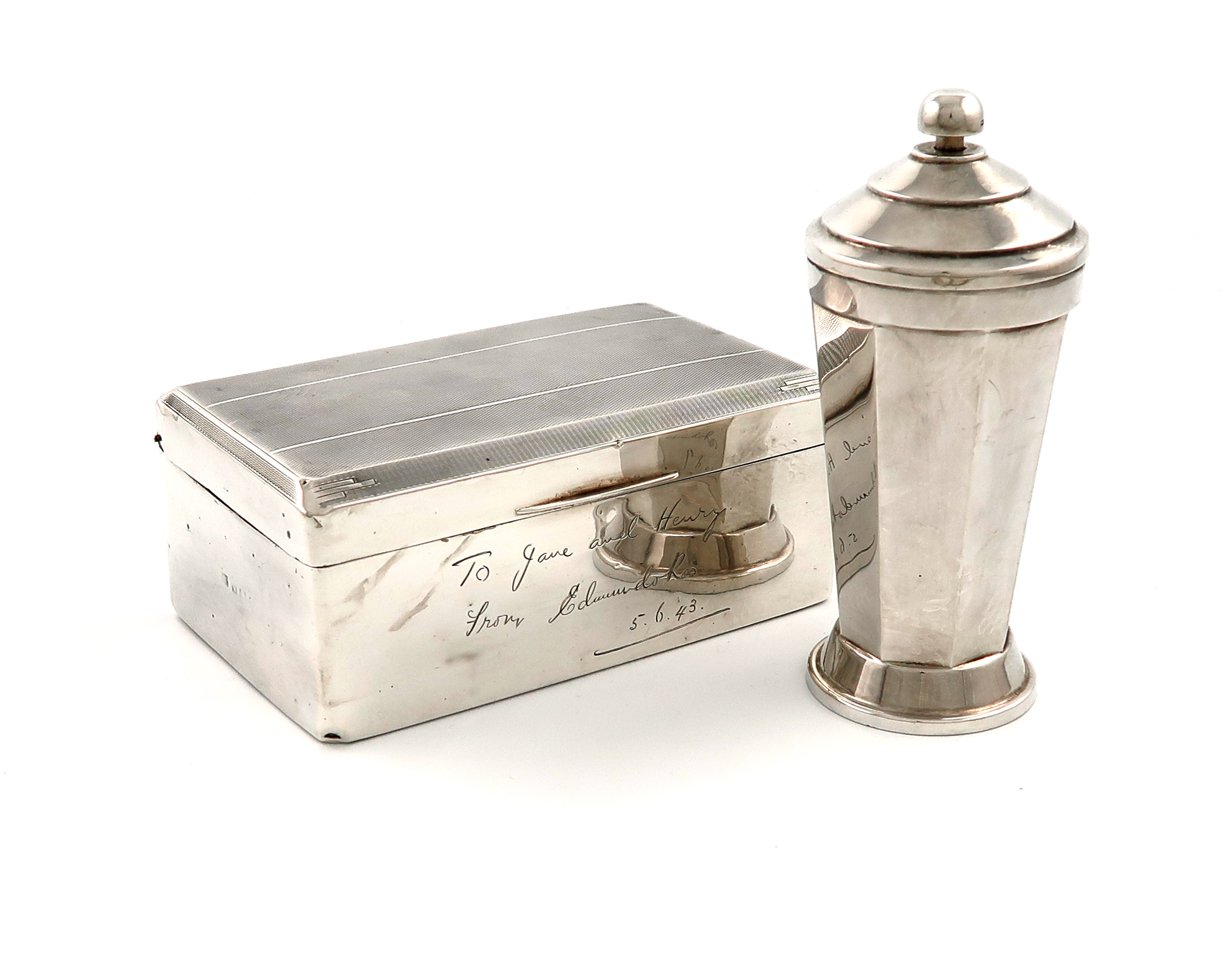 An Art Deco silver push-action sugar caster, by Elkington and Co., Birmingham 1935, tapering faceted