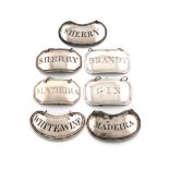 A mixed collection of seven silver wine labels, comprising: a pair by Joseph Willmore, Birmingham