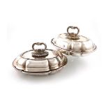 A pair of early-Victorian silver entrée dishes and covers, by Benjamin Smith, London 1843, shaped