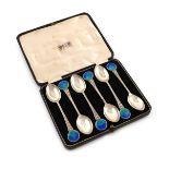 By W. H. Haseler for Liberty, a set of six silver and enamel teaspoons, Birmingham 1914, the