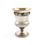 A George III silver goblet, by Paul Storr, London 1819, the campana shaped bowl with fluted