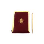 A Victorian 15 carat gold-mounted red leather aide memoire, by Thomas De La Rue, London 1891,
