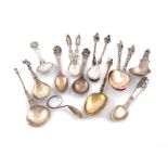 A collection of foreign silver and metalware spoons, comprising: a 19th century Dutch silver-gilt