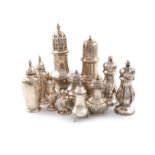 A mixed lot of silver condiments, various dates and makers, comprising: a sugar caster by Walker and