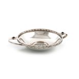 By A. E. Jones, an Arts and Crafts silver two-handled dish, Birmingham 1910, circular from, spot-