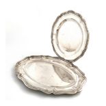 A French silver platter, circular form, moulded border, diameter 33cm, plus another silver meat