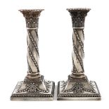 A pair of late-Victorian silver candlesticks, by H. Atkin, Sheffield 1899, Corinthian column form,