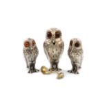 A three-piece modern silver novelty owl cruet set, by Richard Comyns, London 1959, comprising: a