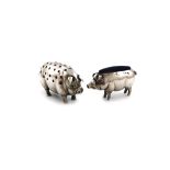 Two Edwardian novelty silver pig pin cushions, one by Levi and Salaman, Birmingham 1905, the other