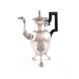 A 19th century French provincial silver coffee pot, maker's mark of E.G with an arrow between,