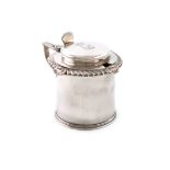 A George IV silver mustard pot, by Emes and Barnard, London 1827, circular form, scroll handle,