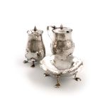 By Liberty and Co, a matched three-piece Edwardian Art Nouveau silver cruet set, Birmingham 1901 and