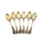 A set of six silver-gilt naturalistic teaspoons, unmarked, probably late-18th century, shell