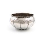 By Hugh Wallis, an Arts and Crafts silver bowl, Chester 1917, circular form, rope-work border,