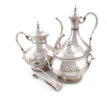 λA late 19th century four-piece French silver tea and coffee set, by Harleux, comprising: a coffee