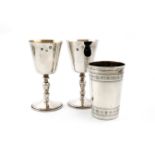 A pair of modern silver goblets, by A Haviland-Nye, Sheffield 1967, tapering circular bowls, on