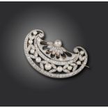 A Belle Epoque pearl and diamond brooch, the stylised fan is pierced and set with diamond and