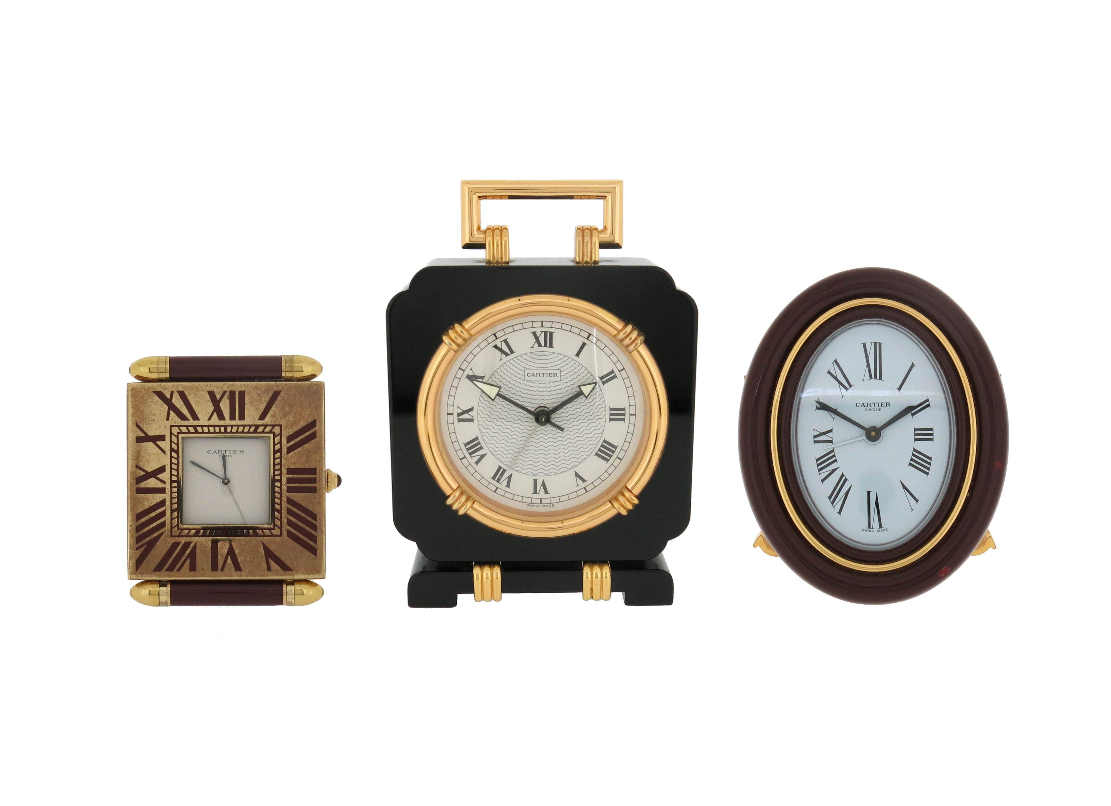 Three travel clocks by Cartier, including a Must de Cartier brass and red enamel travel alarm clock, - Image 2 of 9