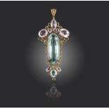 An early 20th century aquamarine and topaz pendant, set with graduated oval-shaped pink topazes