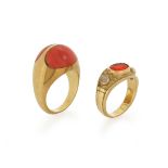 λ A coral-mounted gold bombι ring, set with two coral cabochons in yellow gold, size P, with a