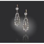 A pair of 19th century diamond drop earrings, set with graduated old cushion-shaped diamonds in