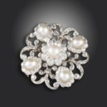 A late Victorian natural pearl and diamond brooch, set with pearl and diamond clusters in