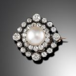 A Victorian freshwater natural pearl and diamond target brooch pendant, of quatrefoil design, the