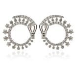 A pair of diamond hoop earrings, set with graduated round brilliant-cut diamonds weighing