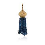 A sapphire bead tassel pendant, the gold engraved dome-form pendant suspends graduated sapphire