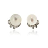 A pair of cultured pearl cluster earrings, the pearls measure approximately 12.1 - 12.3mm, set