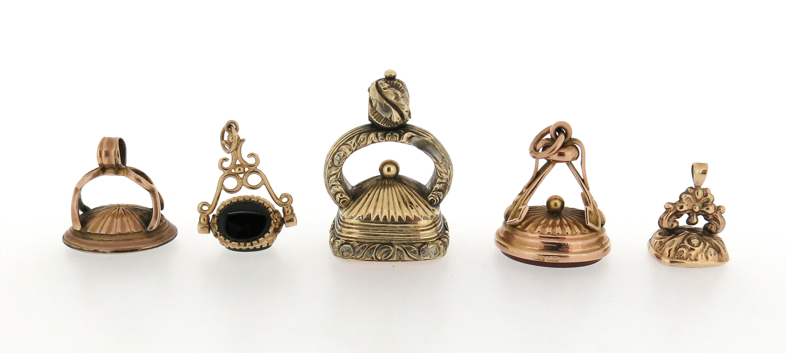 Five gold and gold-cased fob seals, set with various plain and engraved hardstone seal - Image 9 of 10