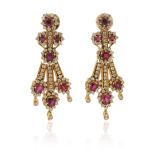 A pair of ruby and diamond drop earrings, set with ruby and diamond clusters suspended on lines of
