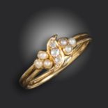 A Victorian seed pearl and diamond ring, the scroll centre section set with graduated old circular-