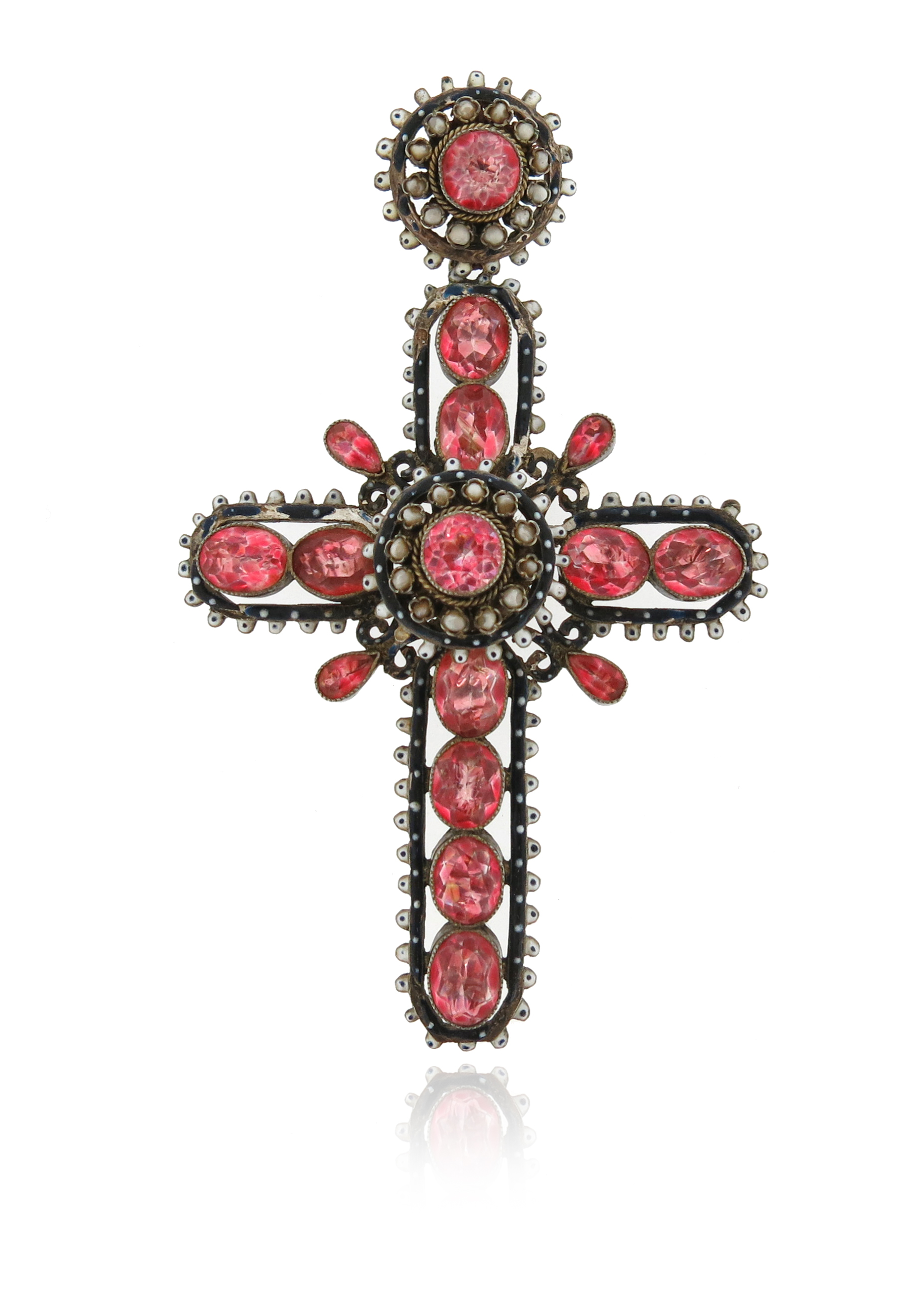 A 19th century Renaissance Revival cruciform pendant, set with foil-backed pink pastes and seed