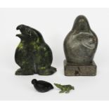 R. Tinnyunt (20th century) Madonna and child serpentine, signed on the base, 27.5cm high, an Inuit