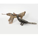 A carved wood model of an anteater, with applied metal tongue, a carved wood model of a bird with