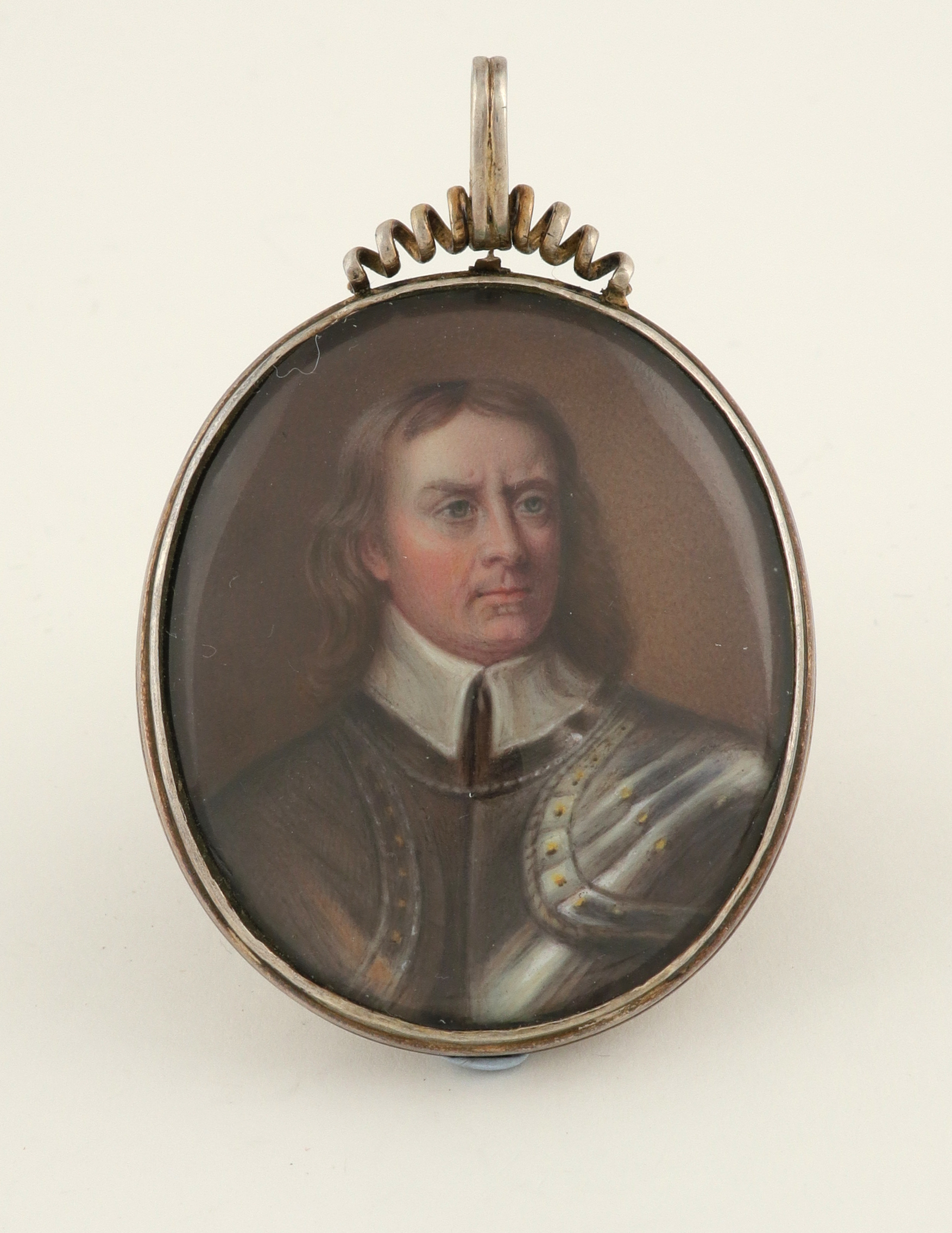 λAfter Robert Walker Portrait miniature of Oliver Cromwell, wearing armour Oval in a white metal