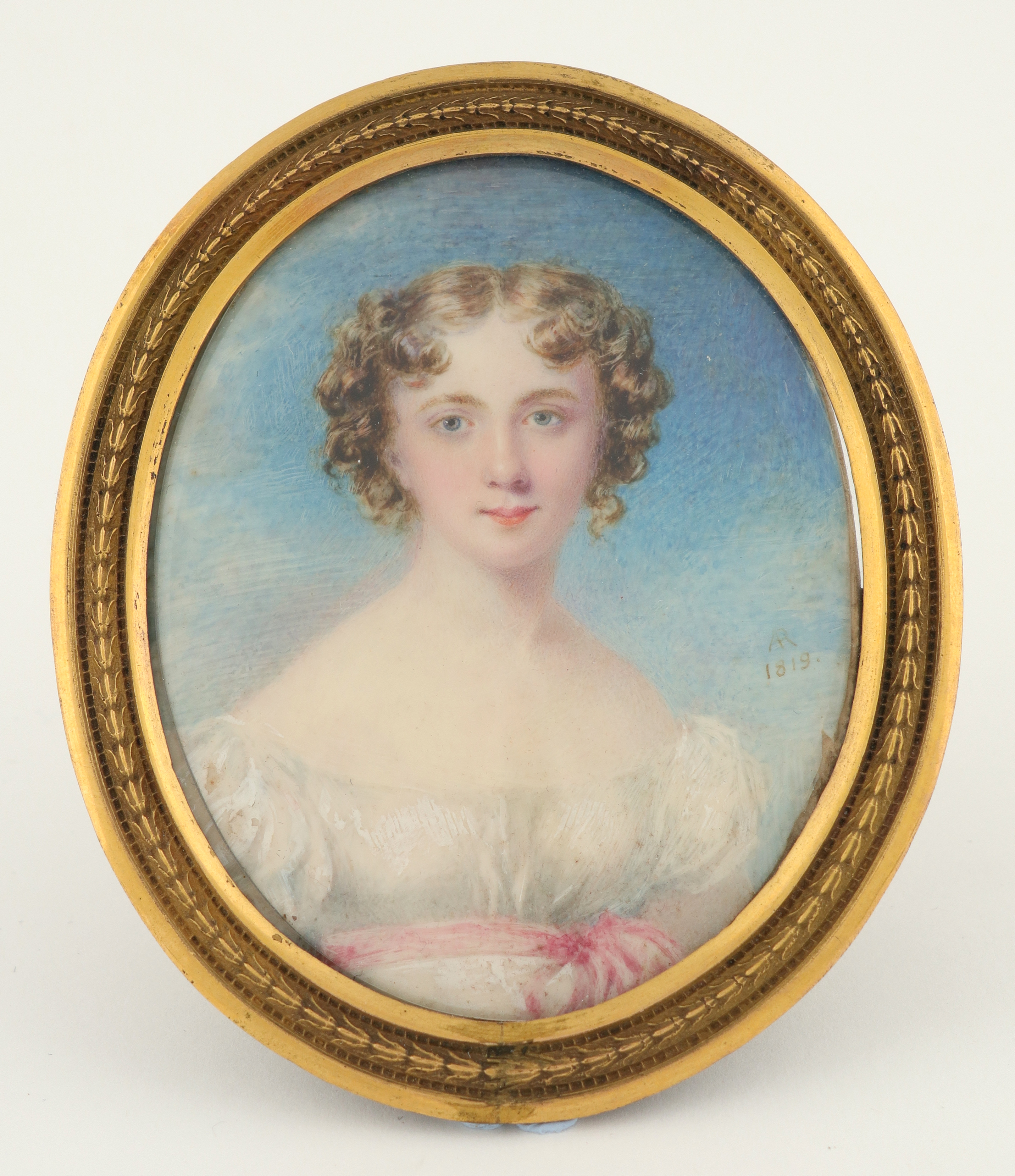 λAndrew Robertson (1777-1845) Portrait of a young lady, head and shoulders in a white dress with a