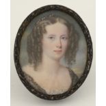 λEnglish School c.1840 Portrait miniature of a young lady, ringlets and pearls in her hair and a
